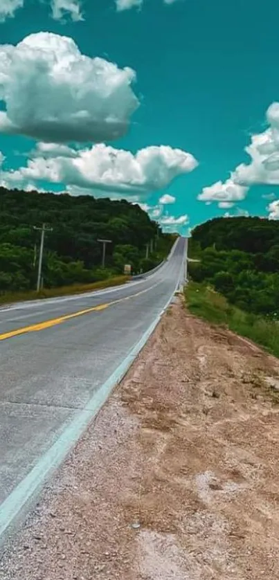 Endless road under a blue sky with clouds.