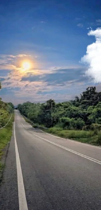 Scenic road under sunset sky with lush greenery and tranquil atmosphere.