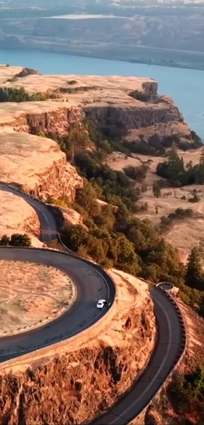 Winding road with scenic cliffs above the sea.