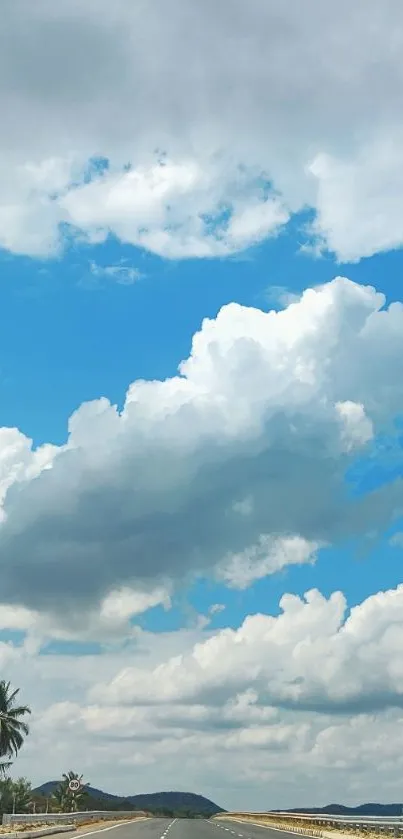 Scenic road beneath a vibrant cloudy sky.