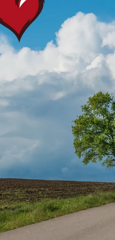 Scenic road under a sky with a heart and tree.