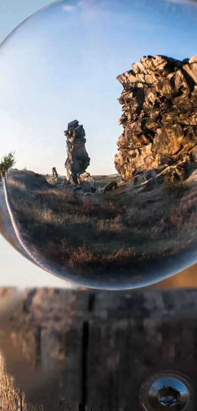 Rock formation reflection in a crystal sphere wallpaper.