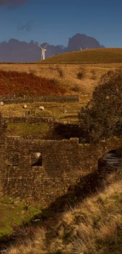 Ruins in autumn hills with wind turbines and dramatic sky.