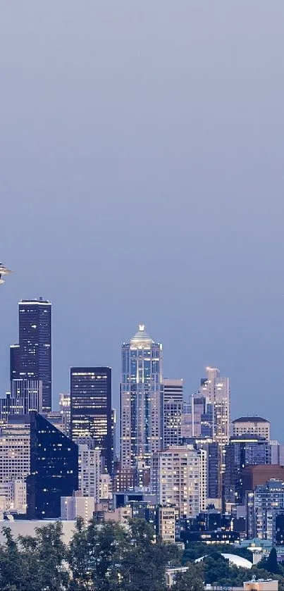 Seattle skyline at evening with clear sky.