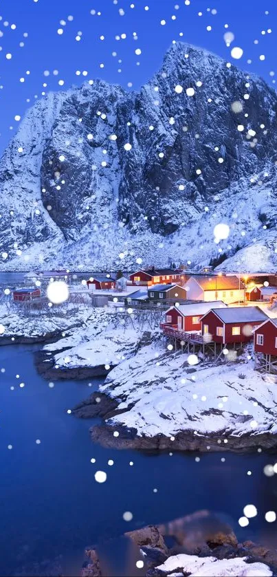 Snowy Nordic village with red houses and mountain backdrop.