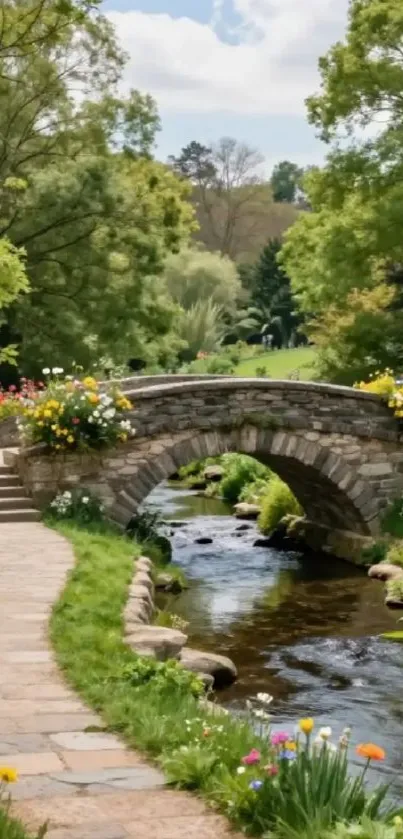 Stone bridge over a stream in a colorful garden.
