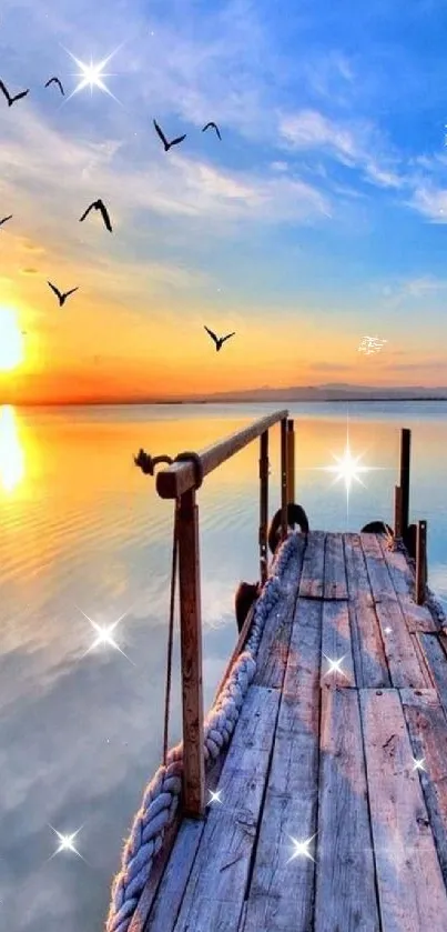 A tranquil dock scene at sunset with birds flying in the sky.