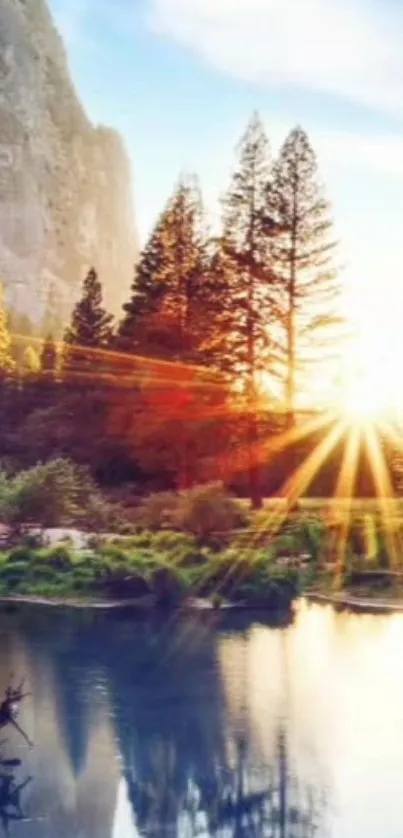 Sunset over a mountain landscape with trees and river.