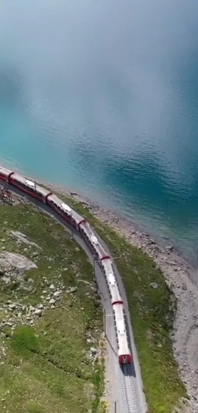 Scenic train journey beside a clear blue lake