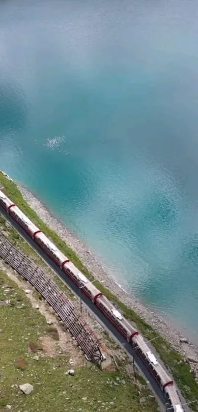 Long train by turquoise lake, scenic view.