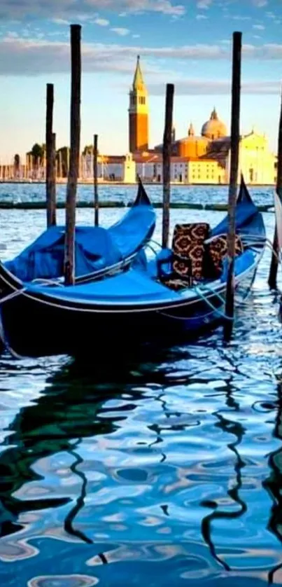 Gondolas in Venice with sunset and water reflections.