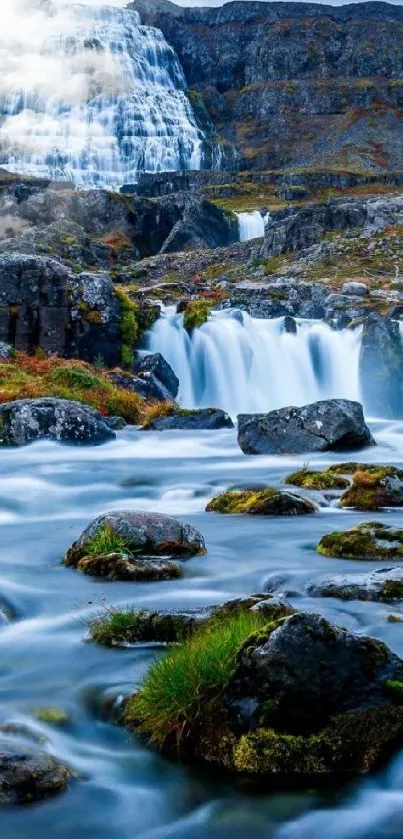 Scenic Icelandic waterfall with flowing water and rocky terrain.