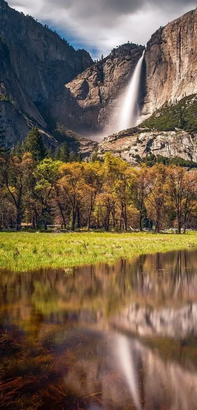 Breathtaking waterfall with mountain view, reflecting in calm water.