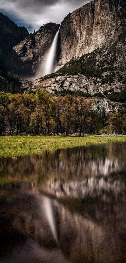 Scenic waterfall with a reflection on a serene landscape.