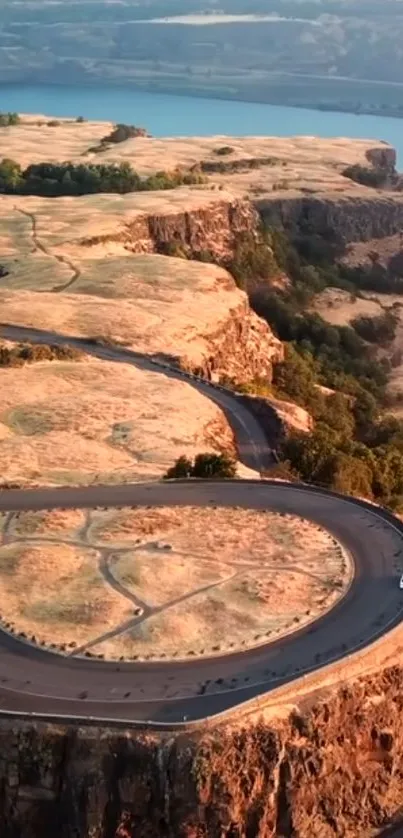 A beautiful winding road through golden cliffs with scenic views.