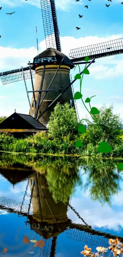 Scenic windmill by tranquil lake wallpaper.