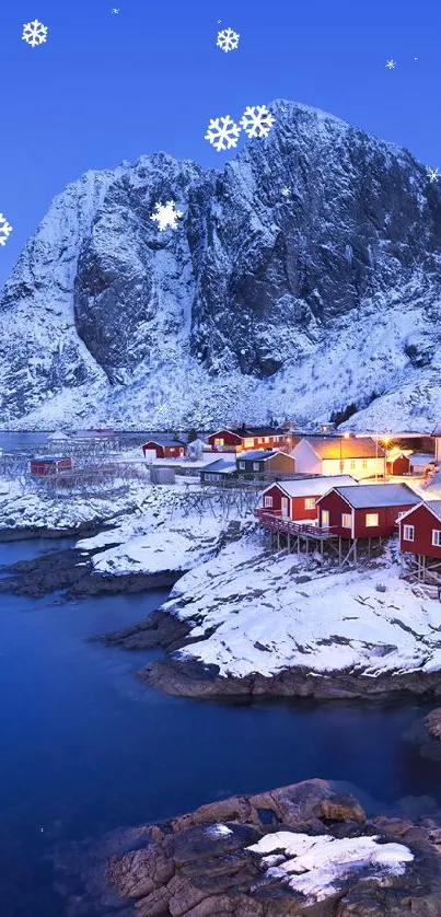 Snowy coastal village with mountains at dusk.