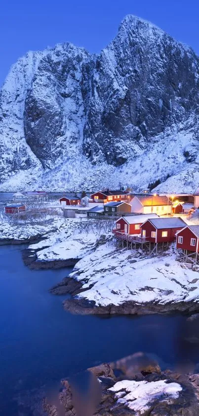 Snowy coastal village and mountain wallpaper with blue hues.