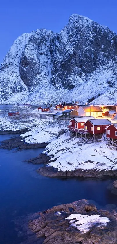 Majestic winter landscape with snow-covered village and mountains.