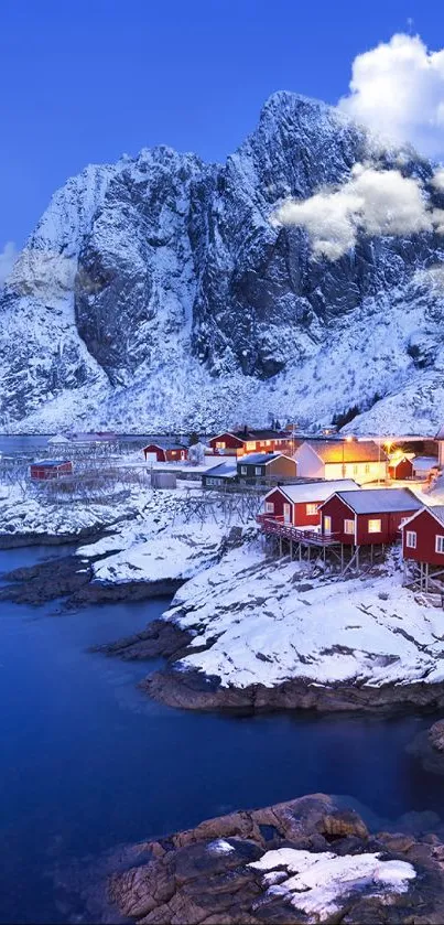 Serene winter village near snowy mountains and lake.