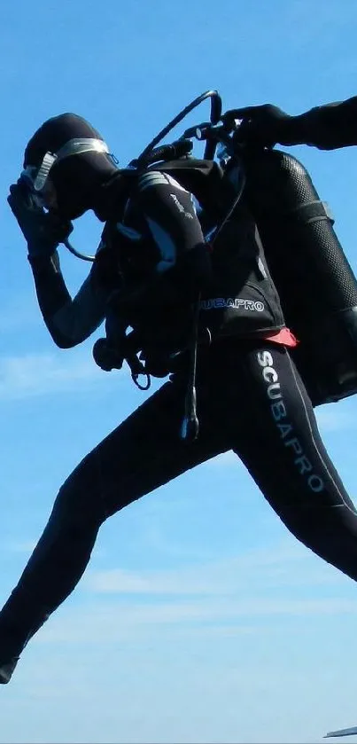 Scuba diver jumping into blue ocean from boat.