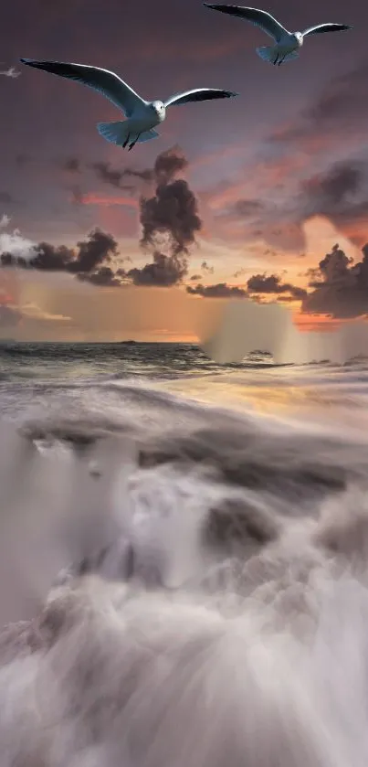 Seagulls flying over a vibrant ocean sunset with dramatic clouds and waves.