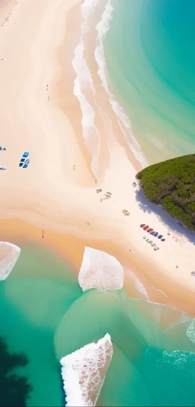 Aerial view of a serene beach with turquoise waters and lush greenery.