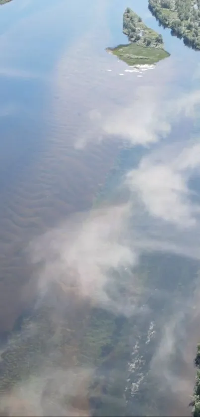 Breathtaking aerial view of a river with clouds and greenery.