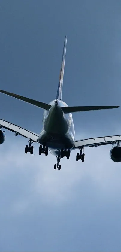 Airplane silhouette flying in cloudy sky.