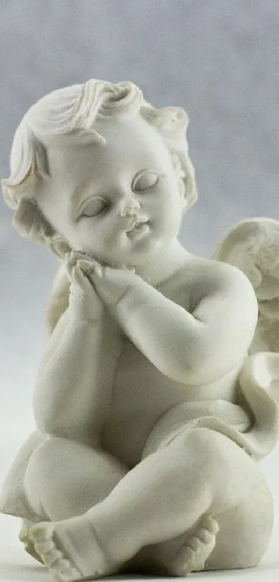 Serene angel statue mobile wallpaper in soft light gray tones.