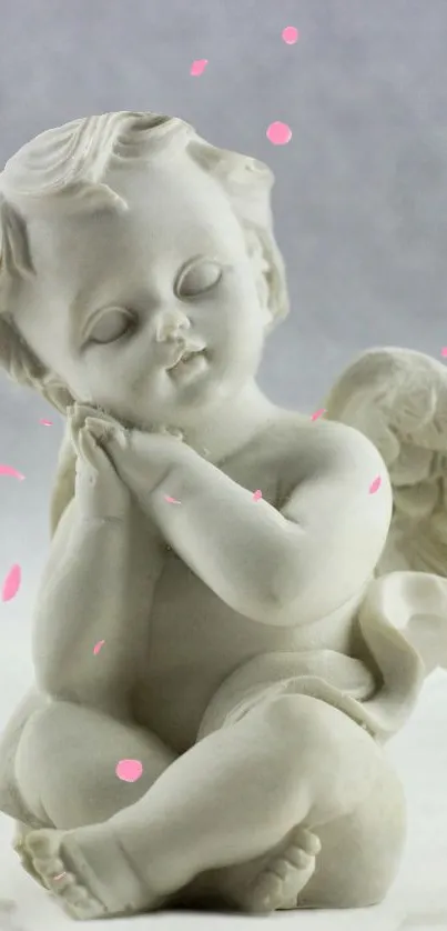 Serene angelic figurine with pink accents in a peaceful aura.