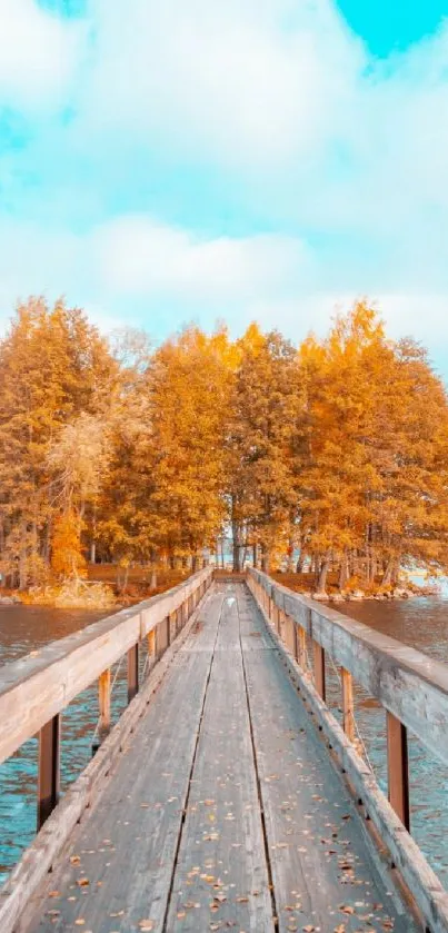 Autumn lake with orange trees and wooden bridge under a turquoise sky.