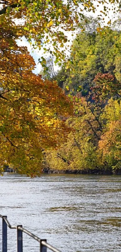 Autumn river landscape with colorful foliage and serene waters.