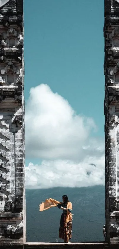 Tranquil Bali temple gateway with sky reflection.