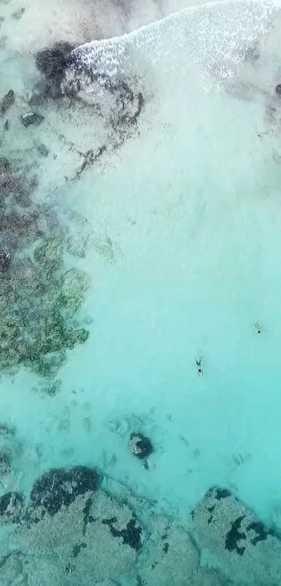 Aerial view of a serene turquoise beach landscape.