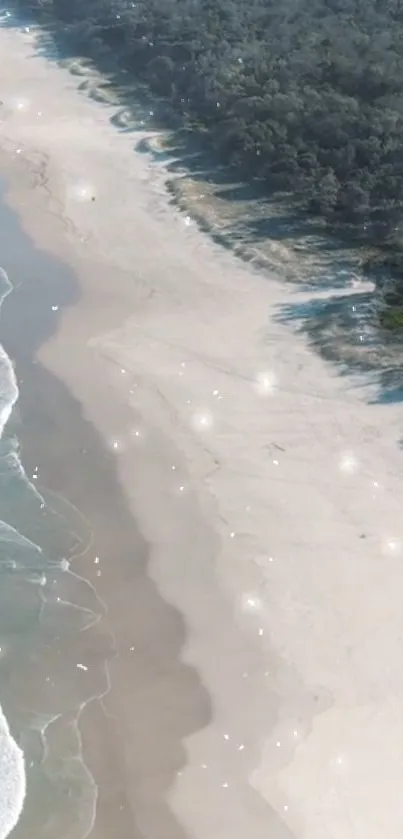 Aerial view of a serene beach with gentle waves and sandy coastline.