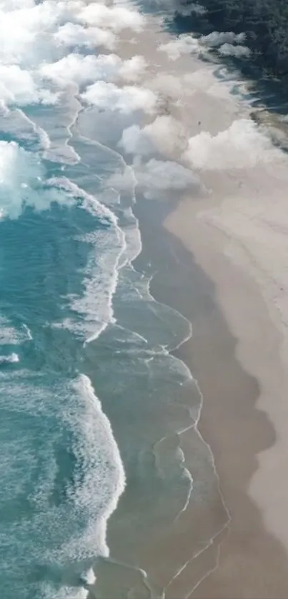 Aerial view of a serene beach with gentle waves and soft sand.