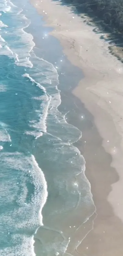 Aerial view of a serene beach with turquoise waves and sandy shore.