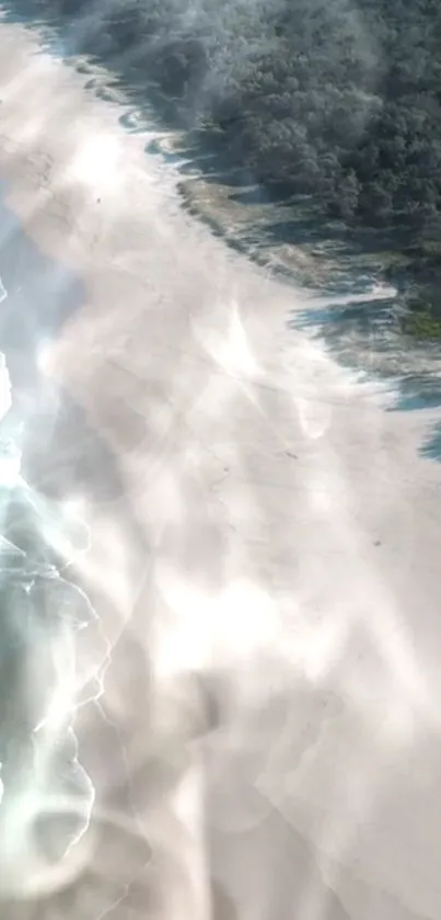 Aerial view of a serene beach with waves, sand, and lush greenery.