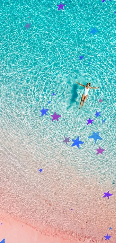 Aerial view of a swimmer in turquoise water above pink sand beach.