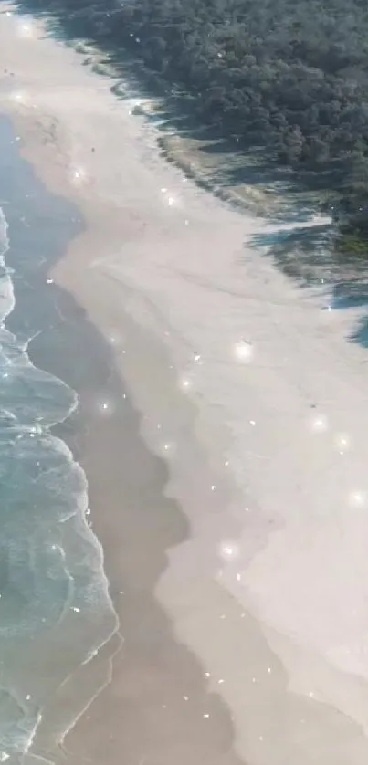 Aerial view of a tranquil beach with sparkling ocean waves.