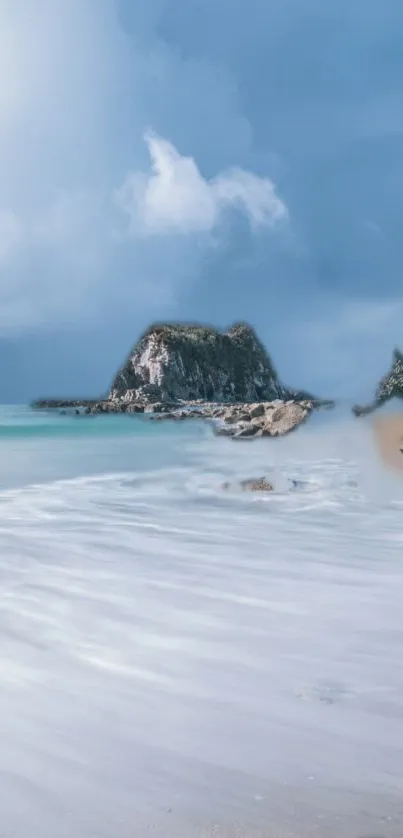 Serene beach scene with ocean waves and a mystical island under a cloudy sky.