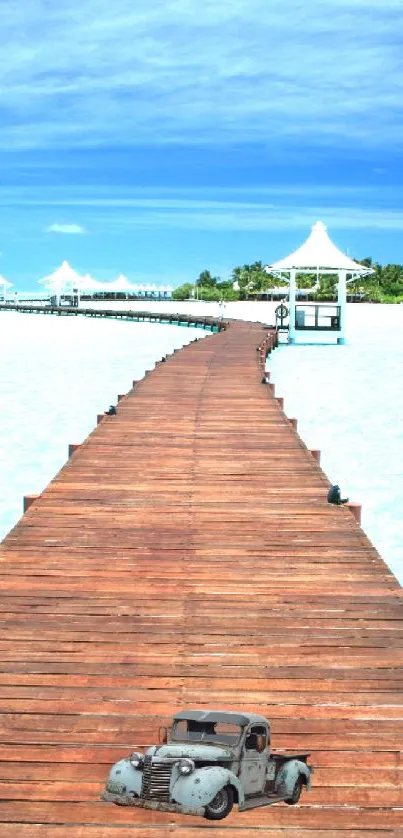 Scenic wooden boardwalk leading to beach under clear blue sky.