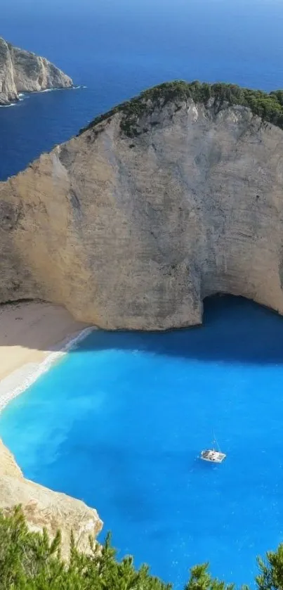 Breathtaking view of a beach, cliff, and bright blue sea.