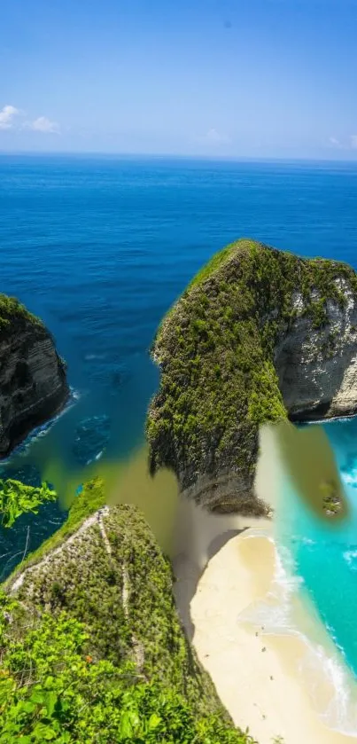 Scenic beach with lush cliffs and azure ocean waters.