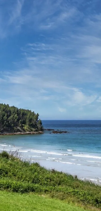 Serene beach landscape with blue ocean and sky.