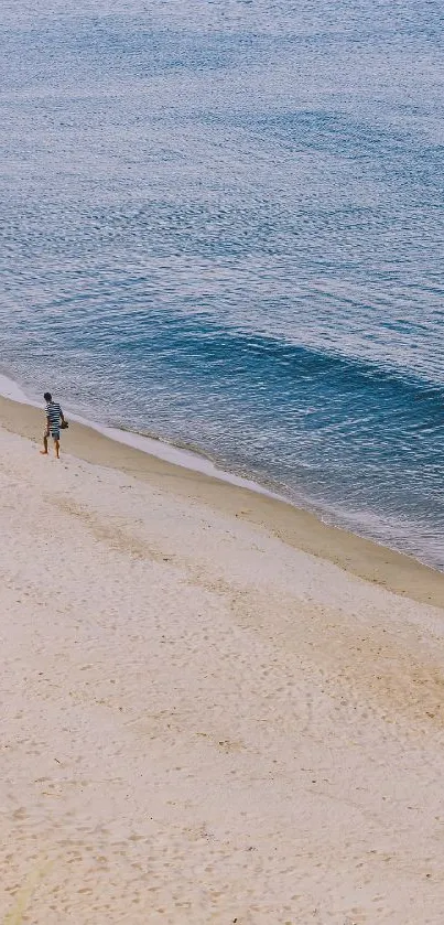 A serene beach scene with calming waves and soft sandy shore.