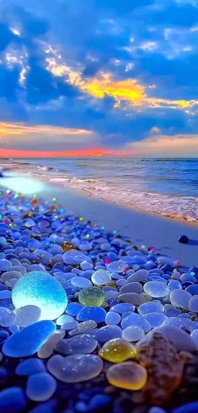 Beach with colorful pebbles at sunset, serene ocean view.