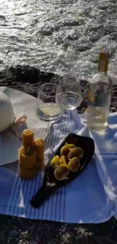 Beach picnic setup with ocean view and sunny backdrop.