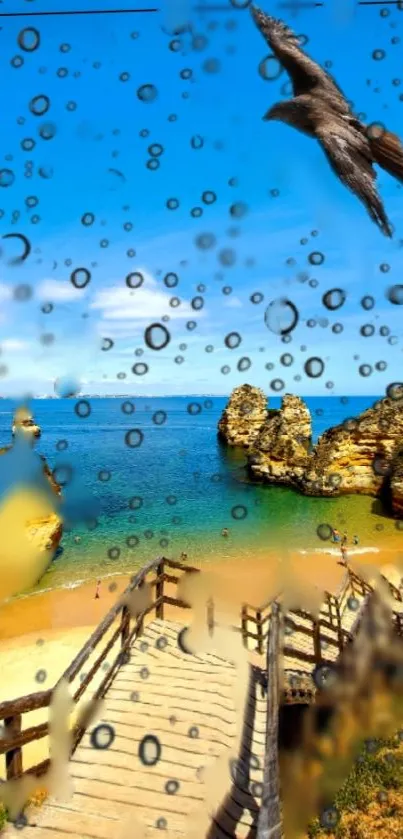 Raindrops and a seagull over a vibrant beach with blue sky.